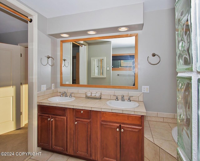 928 Quiet Creek Dr, Homer, AK 99603 - full bath featuring double vanity and tile patterned flooring