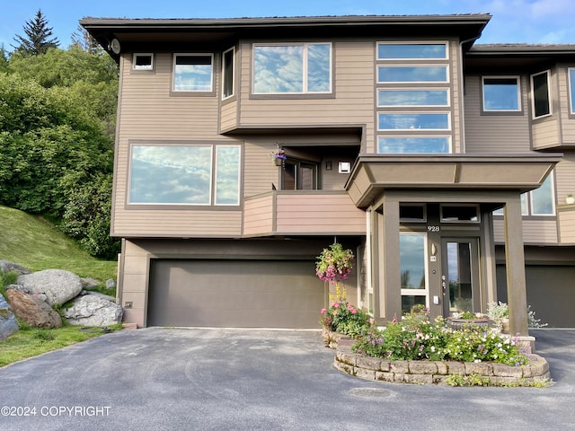 view of front of home with a garage