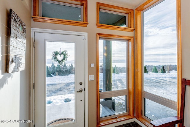 doorway featuring tile patterned flooring