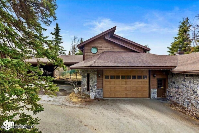 view of front of property with a garage