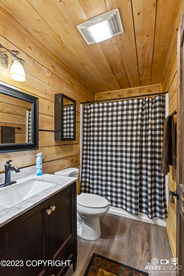 bathroom with toilet, wood ceiling, wooden walls, and wood-type flooring