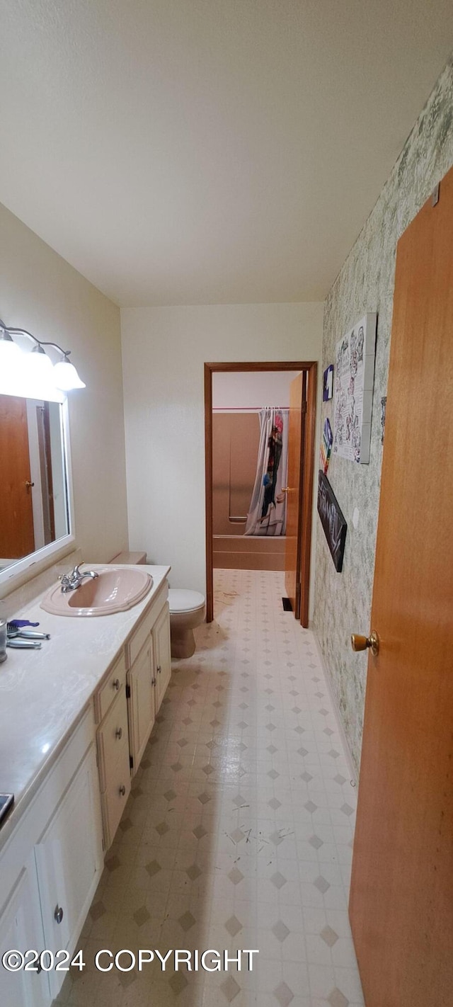 9450 Keshon Cir, Wasilla, AK 99654 - bathroom with tile patterned floors, vanity, and toilet