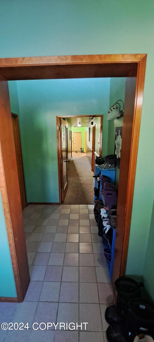 9450 Keshon Cir, Wasilla, AK 99654 - corridor featuring light tile patterned floors