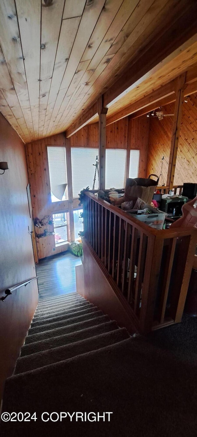 9450 Keshon Cir, Wasilla, AK 99654 - staircase with wood walls and wood finished floors