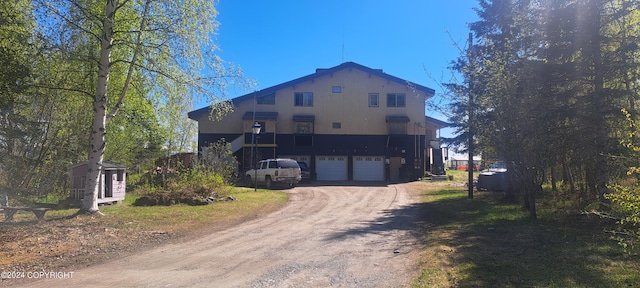 front facade with a garage