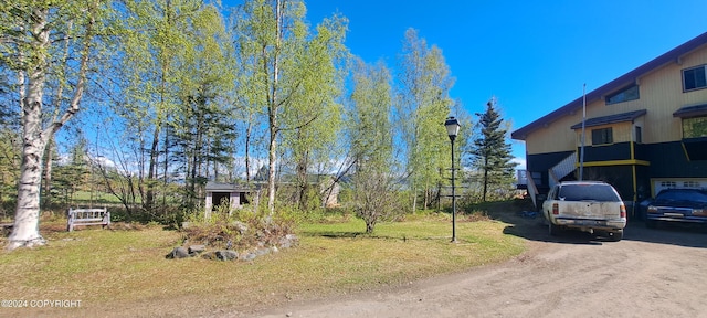 9450 Keshon Cir, Wasilla, AK 99654 - view of front of property with dirt driveway