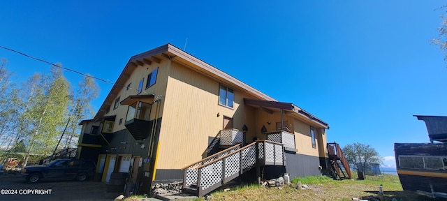 9450 Keshon Cir, Wasilla, AK 99654 - view of side of property with stairway