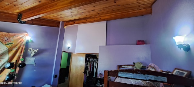 9450 Keshon Cir, Wasilla, AK 99654 - bedroom featuring wooden ceiling with exposed beams