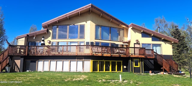 9450 Keshon Cir, Wasilla, AK 99654 - back of house featuring stairway, a wooden deck, and a yard