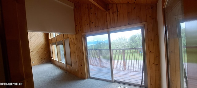 9450 Keshon Cir, Wasilla, AK 99654 - doorway with carpet flooring and wood walls
