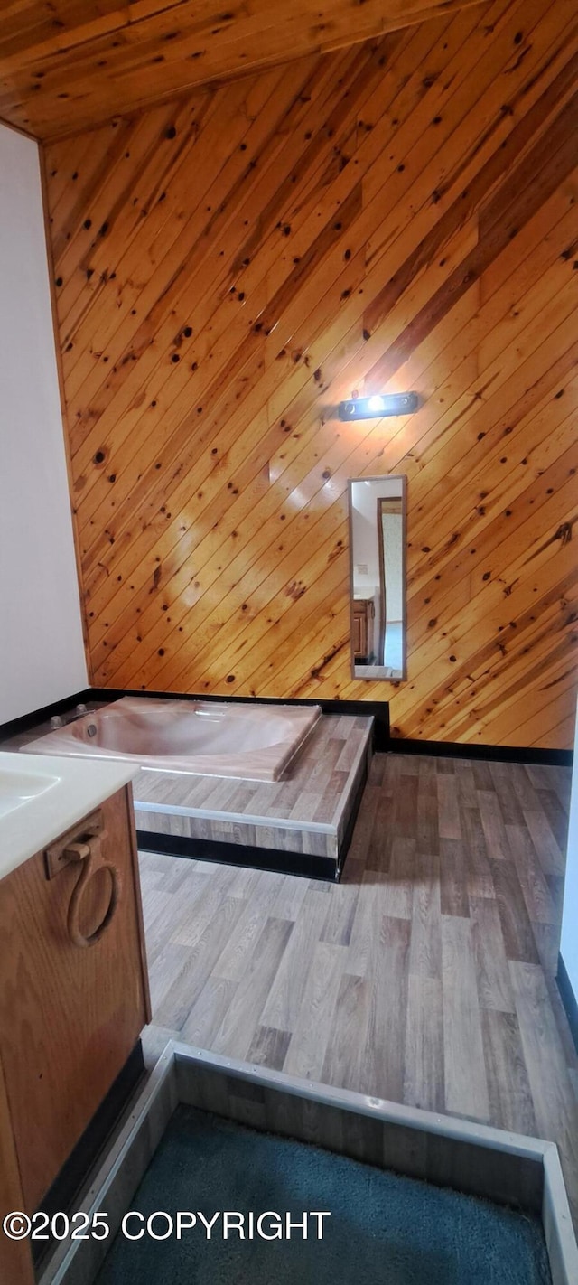 9450 Keshon Cir, Wasilla, AK 99654 - additional living space featuring a sauna / steam room and wood finished floors