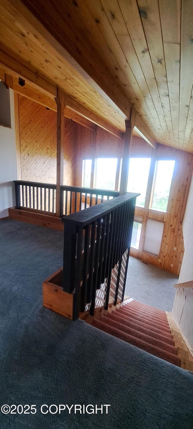 9450 Keshon Cir, Wasilla, AK 99654 - stairway featuring carpet, wooden ceiling, and wooden walls