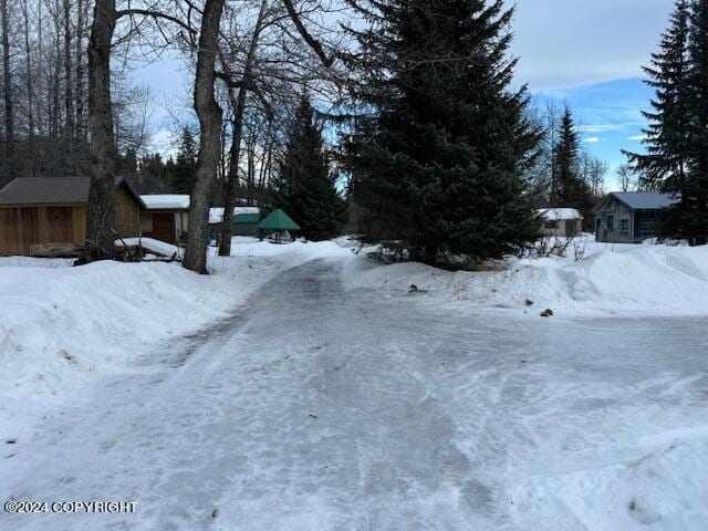 view of yard layered in snow