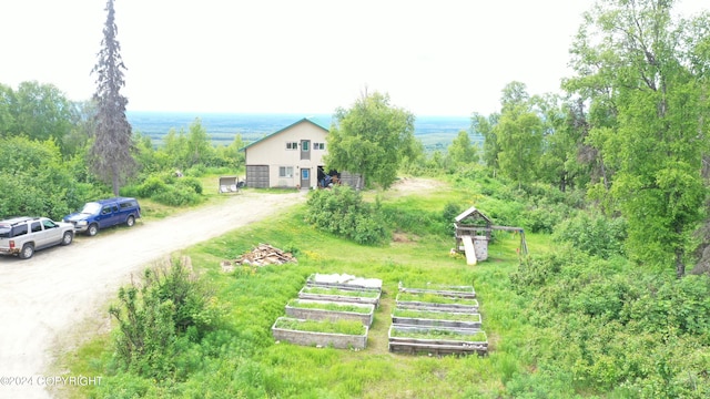 view of front of house with a rural view