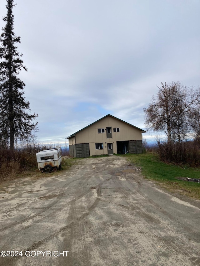 view of front facade with an outbuilding