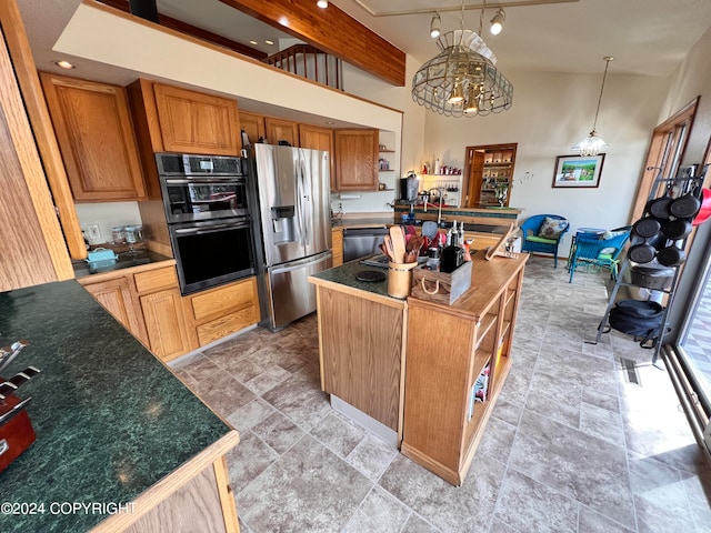 kitchen with light tile patterned flooring, beam ceiling, a kitchen island, stainless steel appliances, and pendant lighting