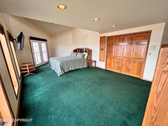 unfurnished bedroom featuring a closet, vaulted ceiling, and dark colored carpet