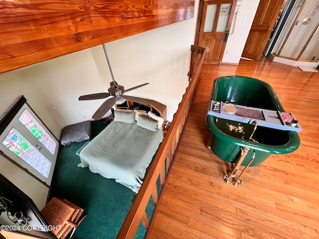 details with ceiling fan and hardwood / wood-style floors