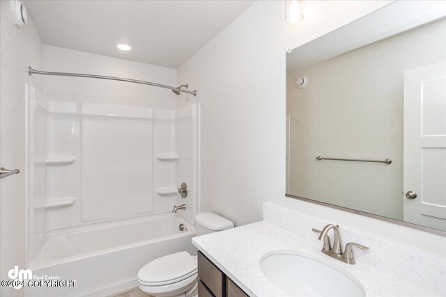 full bathroom featuring vanity, toilet, and shower / bathtub combination