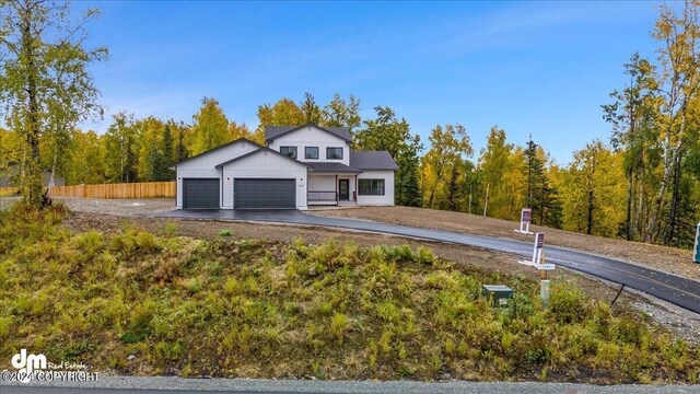 view of front of property with a garage