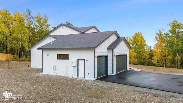 exterior space featuring a garage