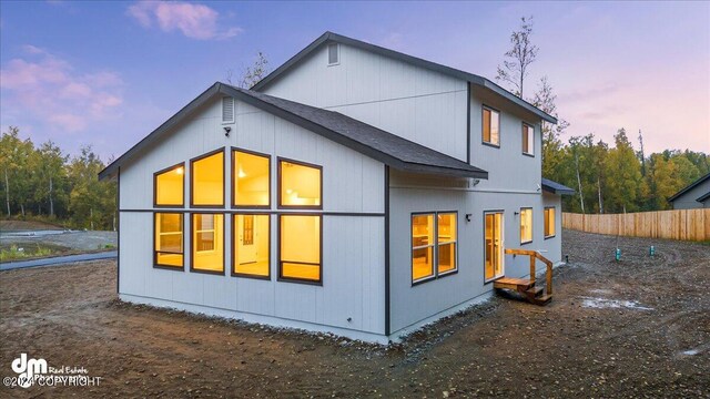 view of property exterior at dusk