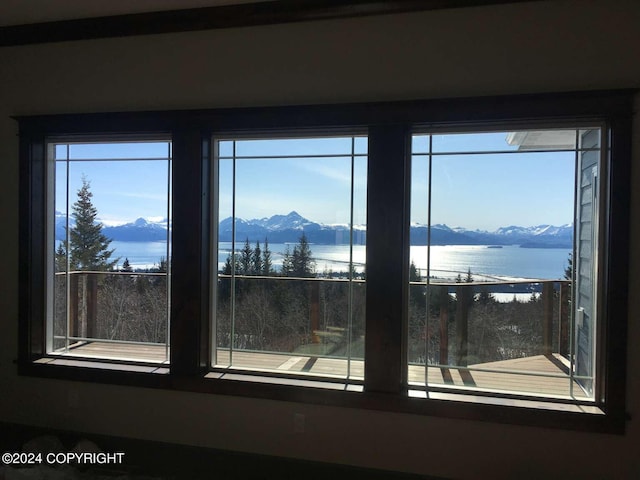 interior details featuring a water and mountain view