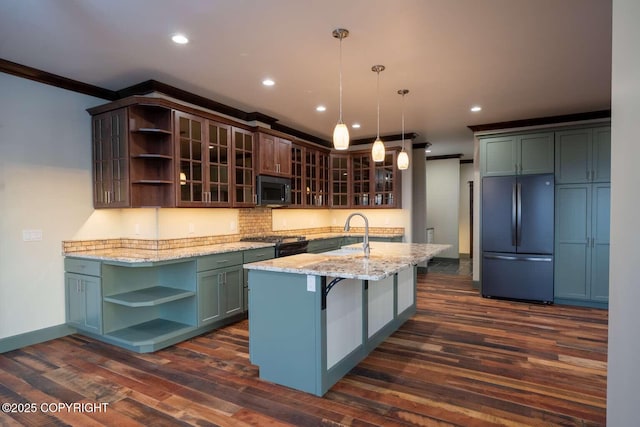 kitchen with light stone counters, pendant lighting, open shelves, glass insert cabinets, and black appliances