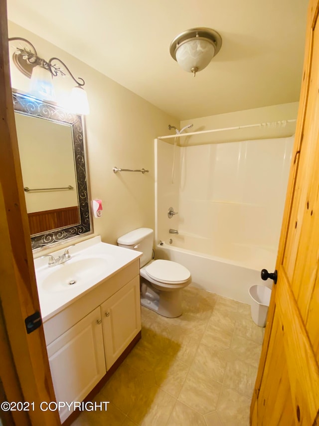 full bathroom with oversized vanity, toilet, shower / washtub combination, and tile floors