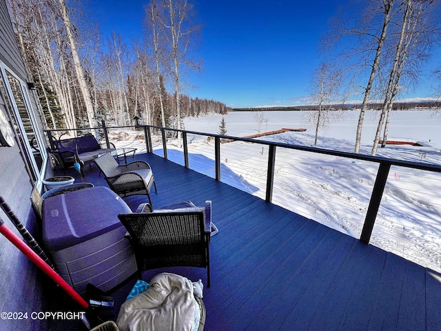 view of snow covered deck