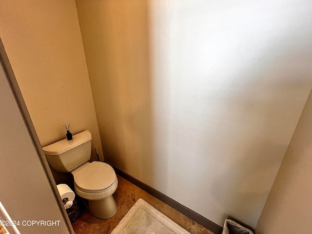 bathroom featuring toilet