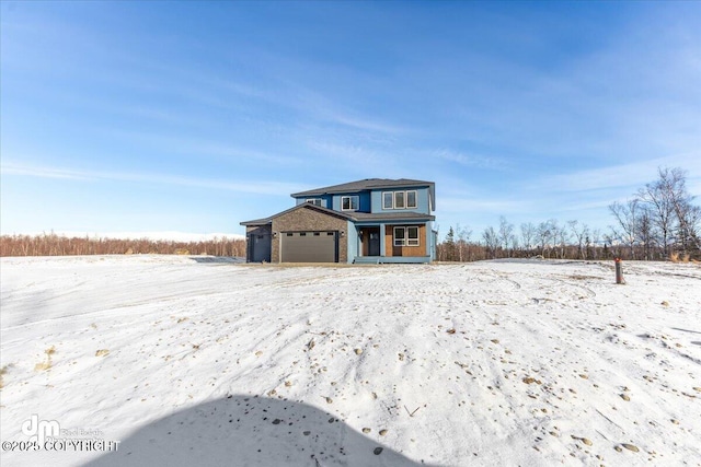 view of front of property with a garage