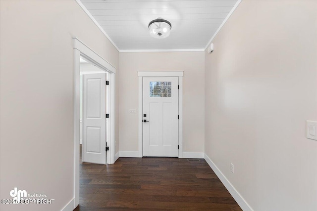 interior space featuring ornamental molding and dark hardwood / wood-style flooring