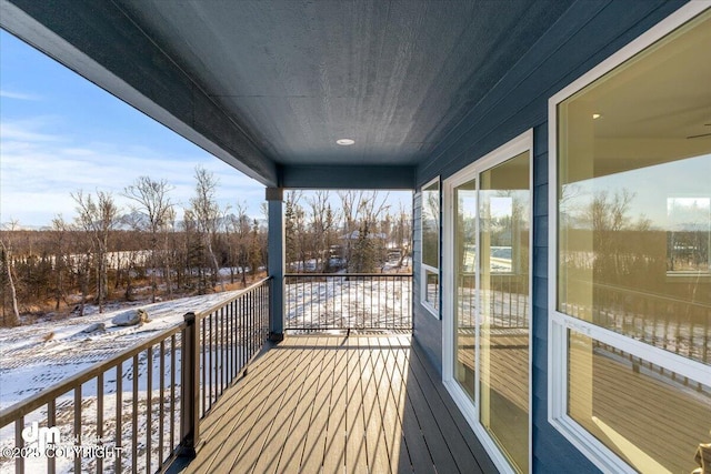 view of snow covered deck