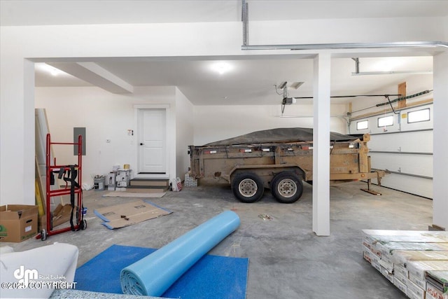 garage featuring a garage door opener