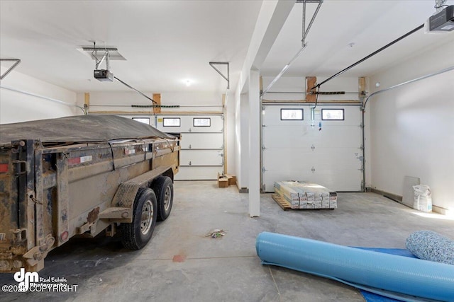 garage featuring a garage door opener