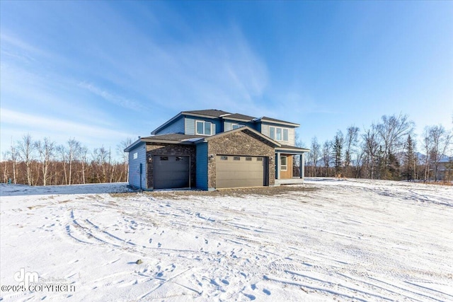 view of snow covered property