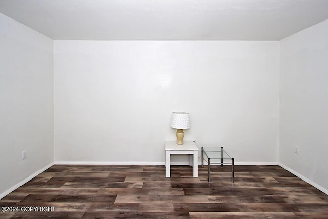 laundry area featuring dark hardwood / wood-style floors