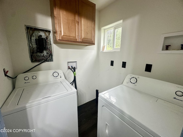 laundry room with cabinet space and separate washer and dryer