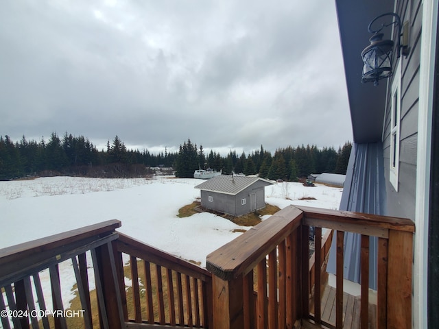 view of snow covered deck