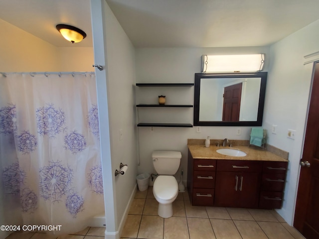 bathroom with vanity, a shower with shower curtain, tile patterned flooring, and toilet