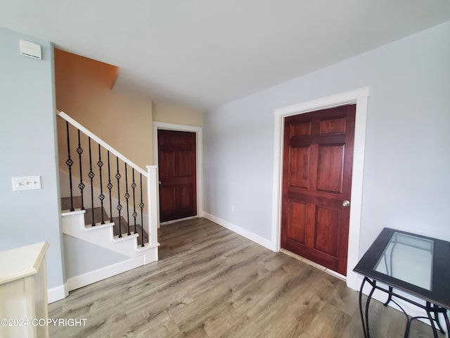 entrance foyer with light hardwood / wood-style flooring