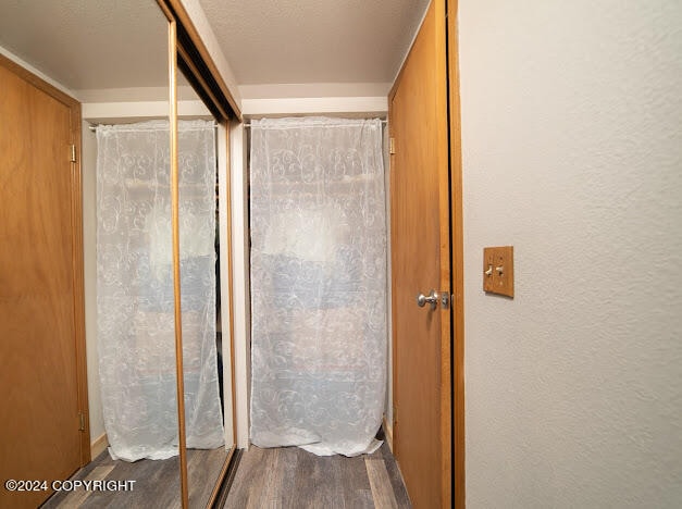 bathroom featuring wood-type flooring