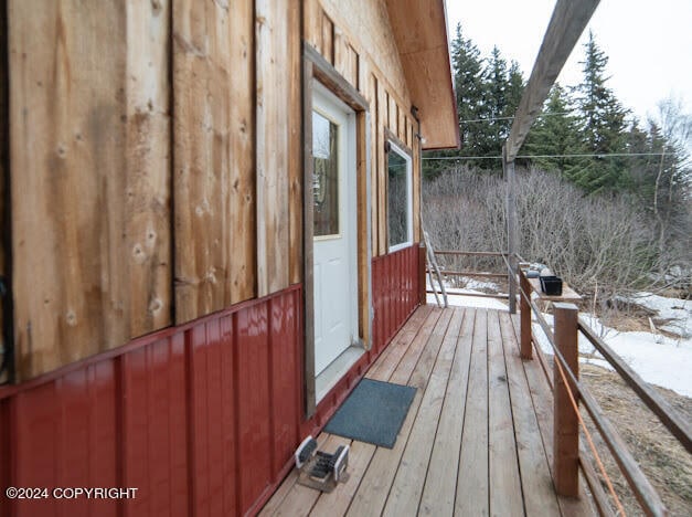 view of snow covered deck