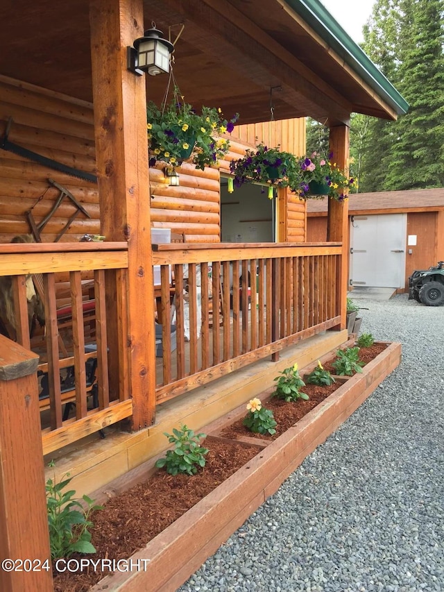 wooden deck with a storage unit