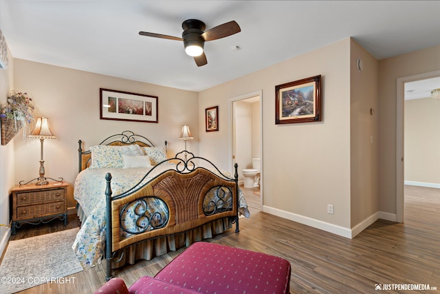 bedroom with ensuite bathroom, hardwood / wood-style flooring, and ceiling fan