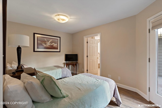 bedroom featuring light wood-type flooring