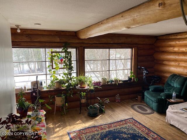 sunroom / solarium with a healthy amount of sunlight