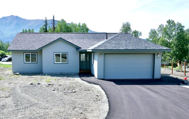 L7 Harman Loop, Wasilla, AK 99654 - ranch-style house with a garage and a mountain view