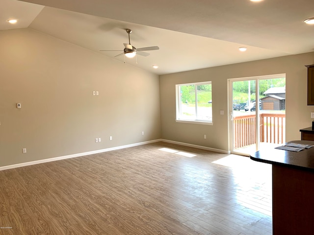 L7 Harman Loop, Wasilla, AK 99654 - interior space with wood-type flooring, ceiling fan, and vaulted ceiling